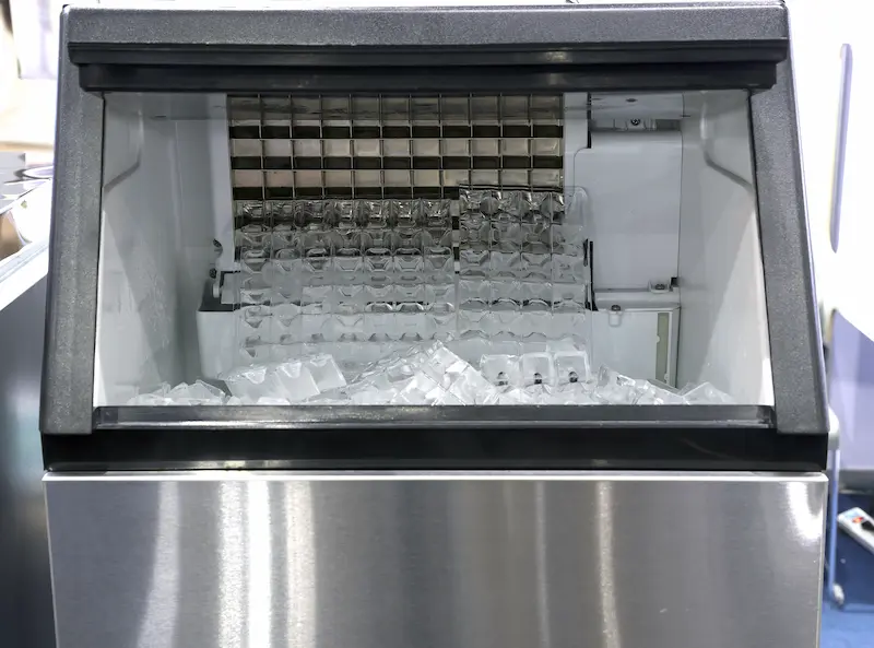 Ice maker machine appliance full of ice